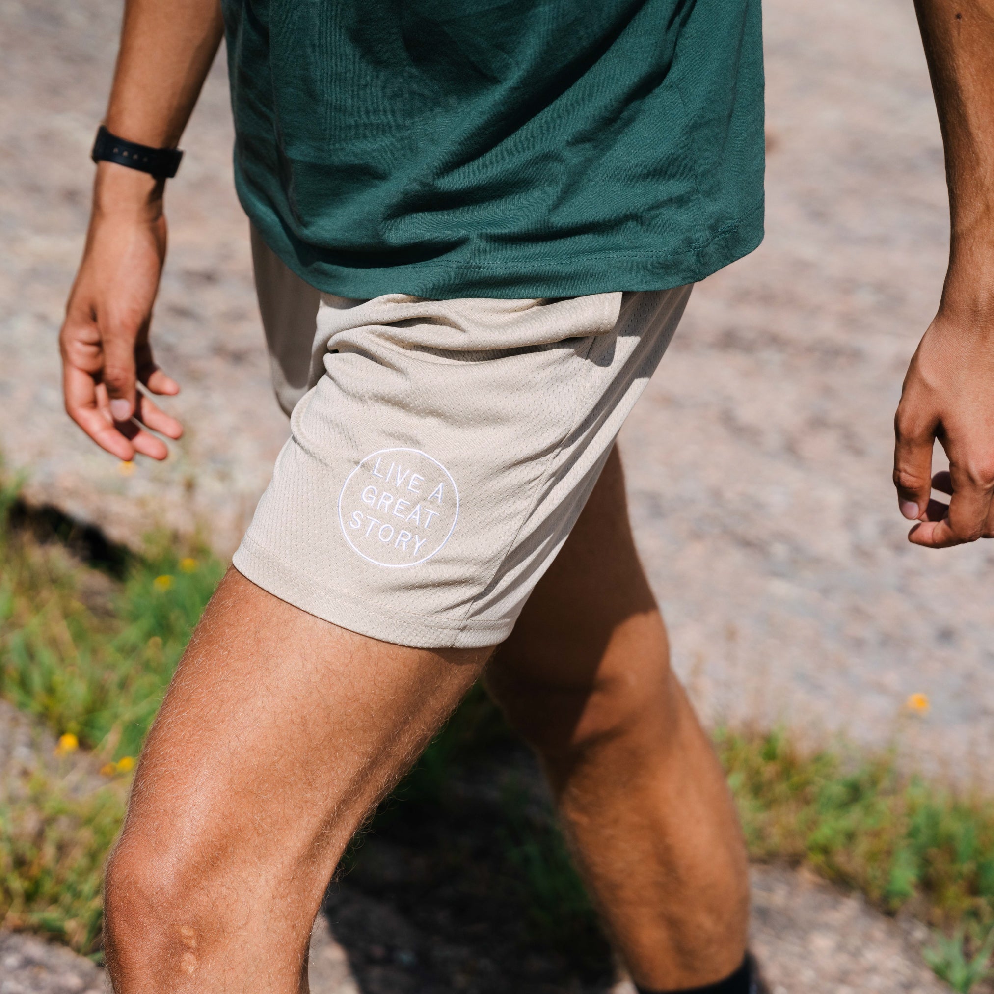 A man wearing light brown LIVE A GREAT STORY Men's Summer Shorts