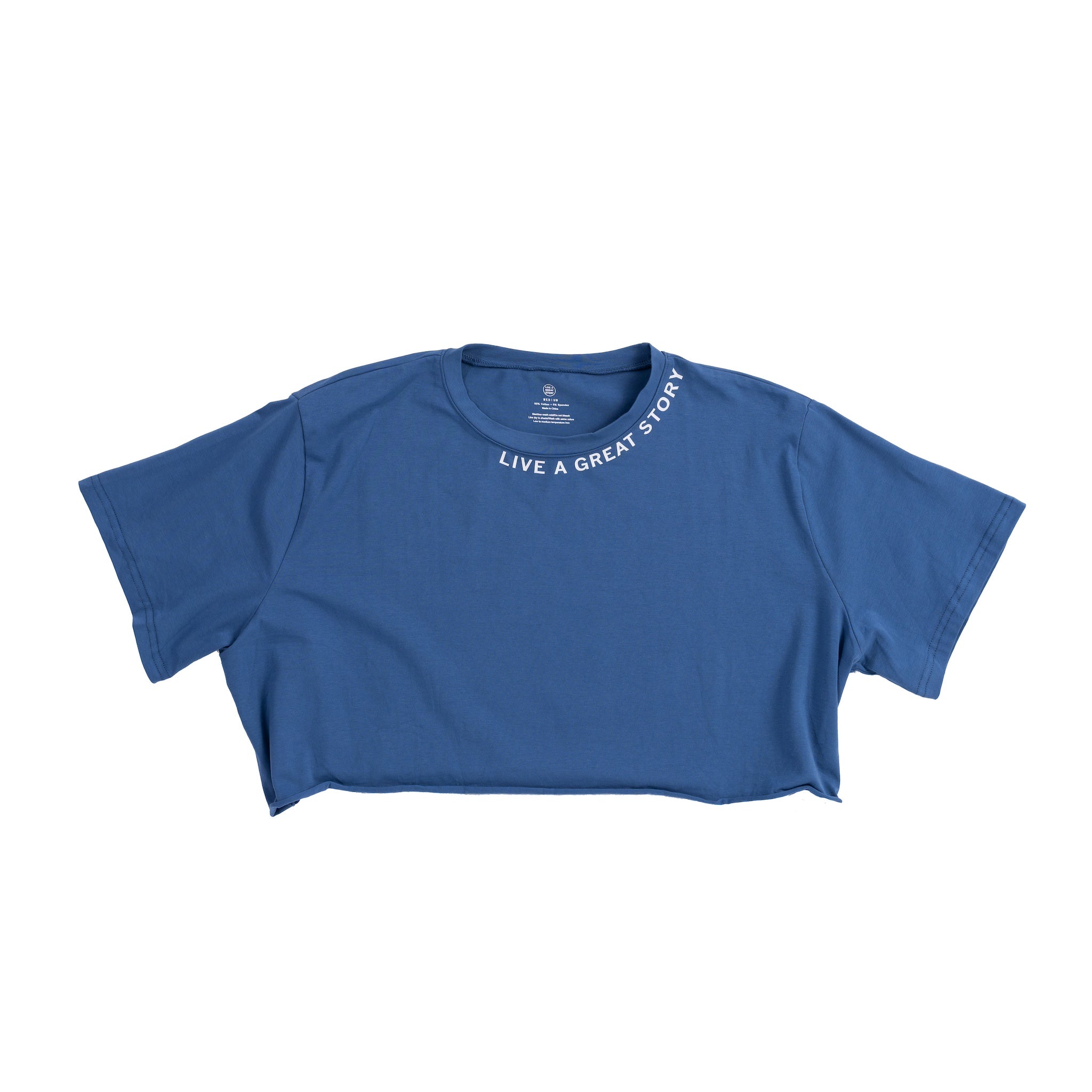 The front view of a blue LIVE A GREAT STORY women's crop top