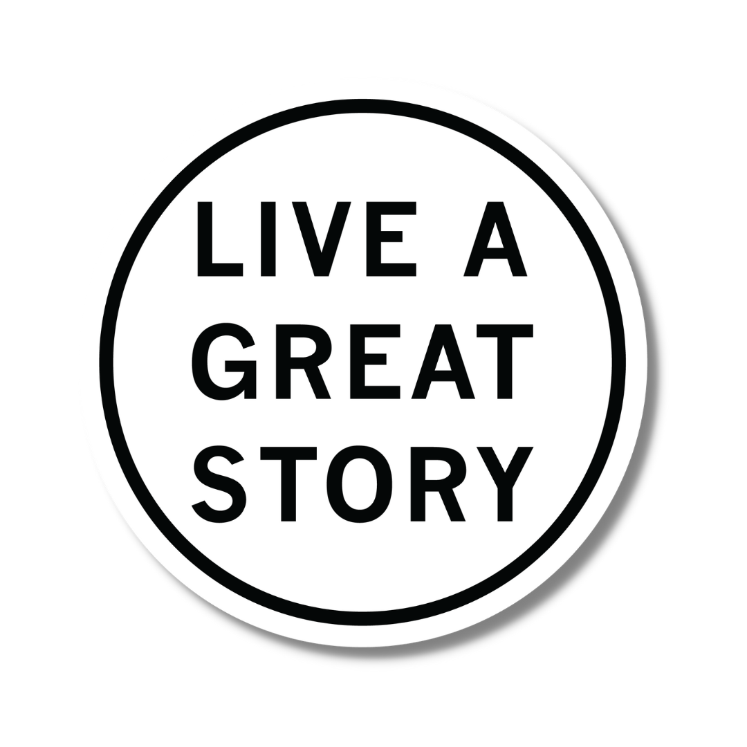 A closeup of a white LIVE A GREAT STORY  Inspirational Sticker