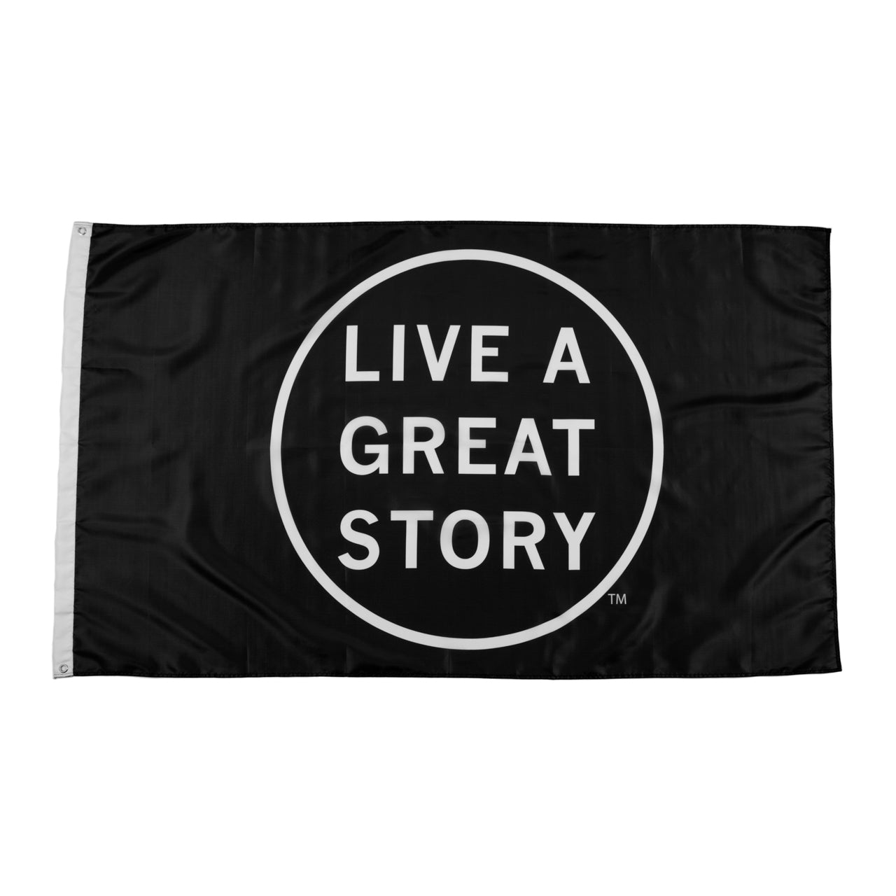 A black LIVE A GREAT STORY Adventure Flag
