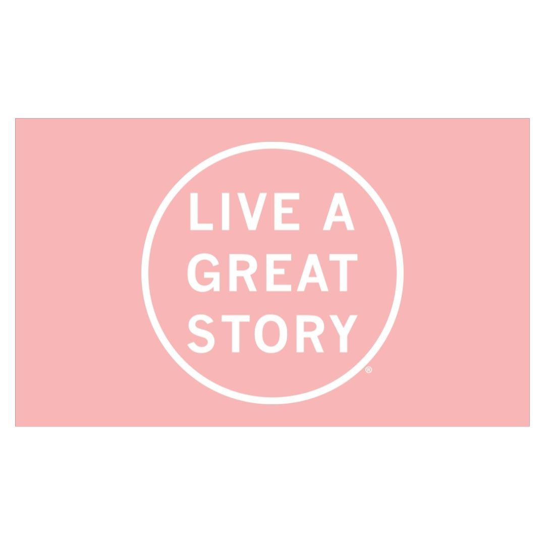 A pink LIVE A GREAT STORY Adventure Flag